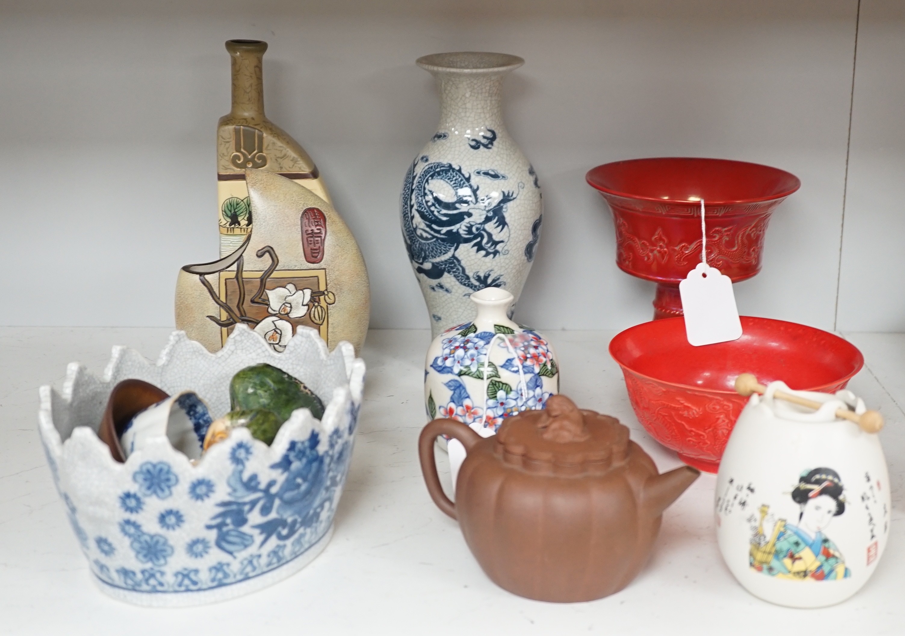 A Chinese blue and white dragon crackle glaze vase, together with a group of Chinese and Oriental ceramics. Tallest 23cm